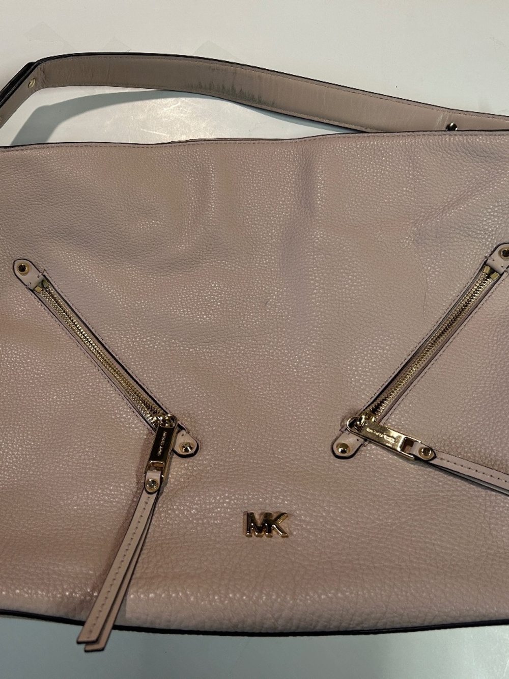 Ladies pink Michael Kors purse and wallet.